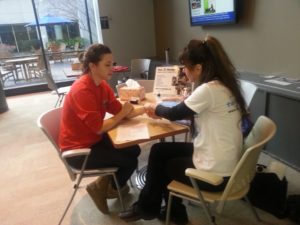 Hand massages for students at Emory University in Atlanta