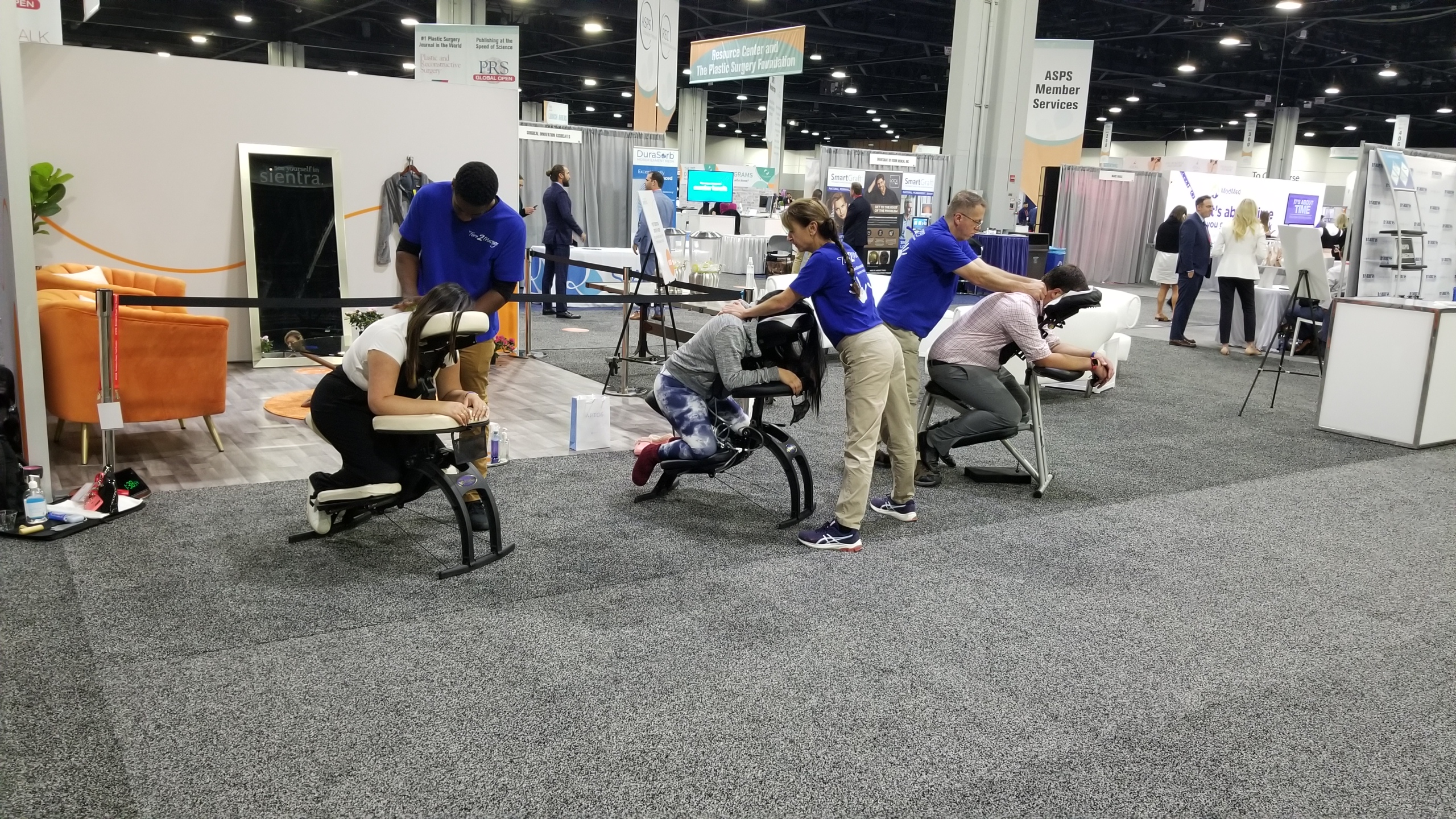 Chair massage at trade show in Atlanta, GA, Tampa, FL, Orlando, FL, Chattanooga, TN by Turn 2 Massage