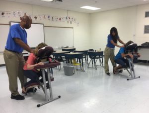 Chair Massage for Teacher Appreciation Day is a treat these teachers won't forget.