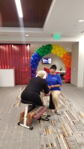 Onsite chair massage being provided by Turn 2 Massage at corporate health fair